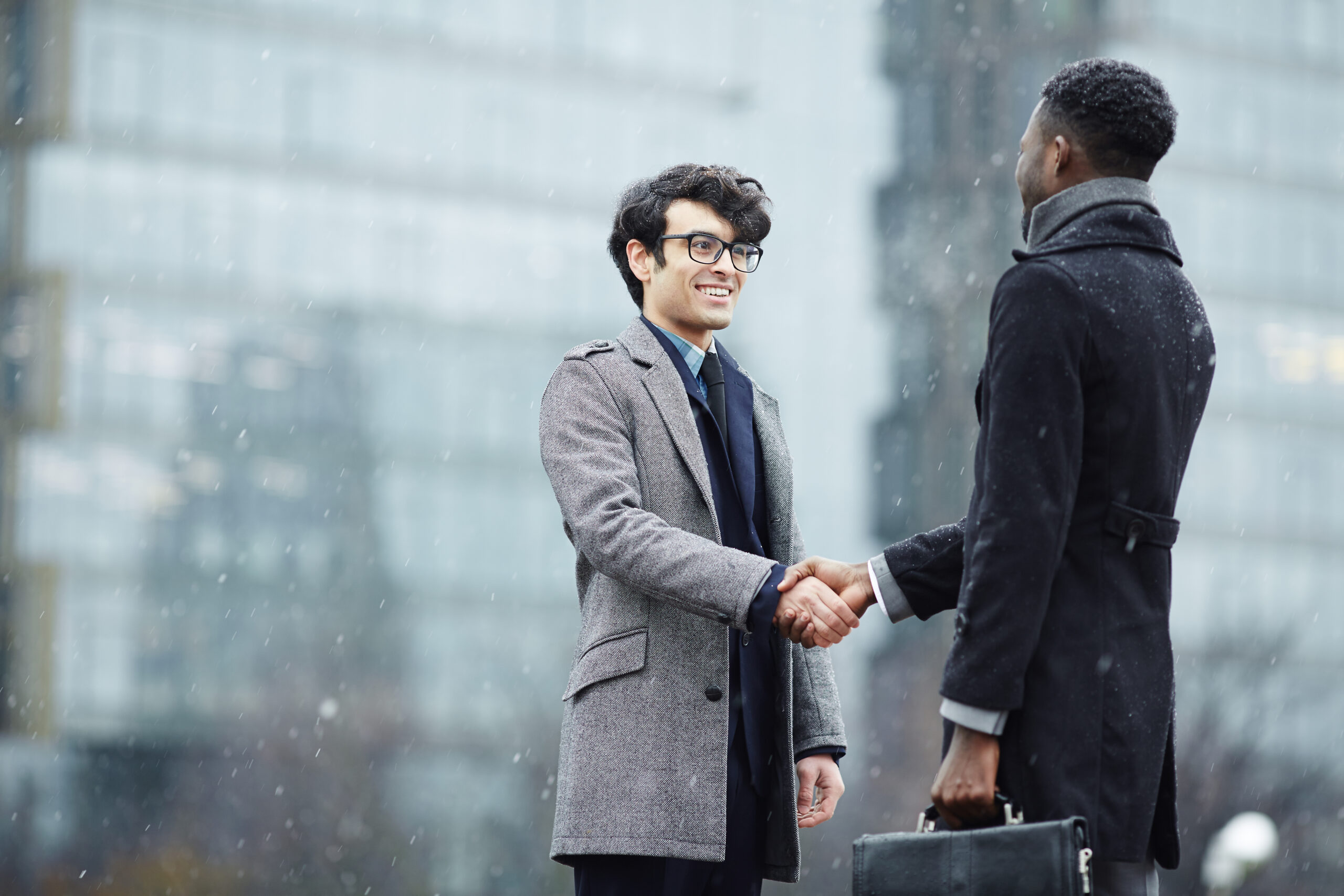 Two Business People Meeting in Street